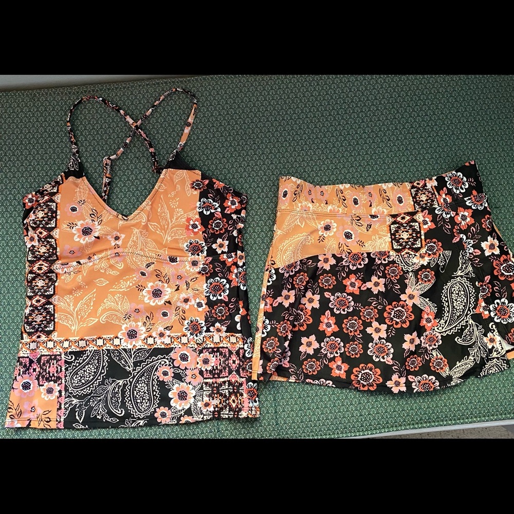 Cute tankini and swim skirt set.